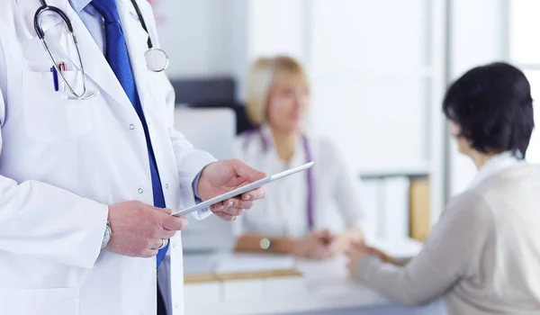 Blank empty computer tablet in the hands of doctor — Stock Photo, Image