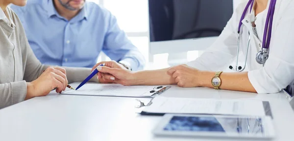 Close up of patient and doctor prescribing medication — Stock Photo, Image