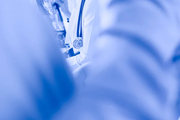 Group of doctors and nurses looking at X-ray — Stock Photo, Image