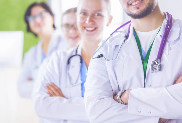 Group of doctors and nurses standing in the hospital room — Stock Photo, Image