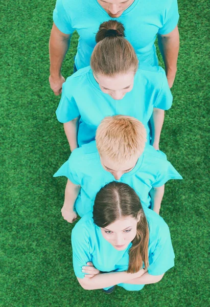 Group of young people sitting on green grass. Selfie — Stock Photo, Image