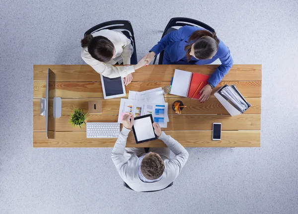 Business people shaking hands during meeting in office — Stock Photo, Image