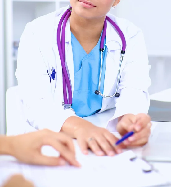 Medical team sitting at the table in modern hospital — Stock Photo, Image