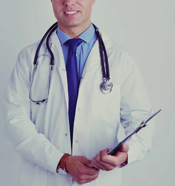 Male doctor standing with folder, isolated on white background — Stock Photo, Image