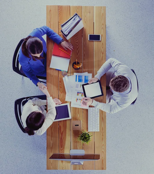 Business people shaking hands during meeting in office — Stock Photo, Image