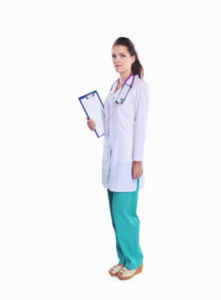 Smiling female doctor with a folder in uniform standing at hospital — Stock Photo, Image