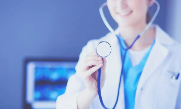 Close-up shot of doctors hands holding stethoscope at clinic. — Stock Photo, Image