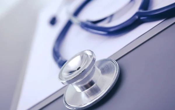 Medical equipment: blue stethoscope and tablet on white background. Medical equipment — Stock Photo, Image