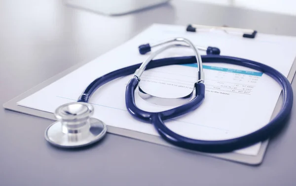 Medical equipment: blue stethoscope and tablet on white background. Medical equipment — Stock Photo, Image