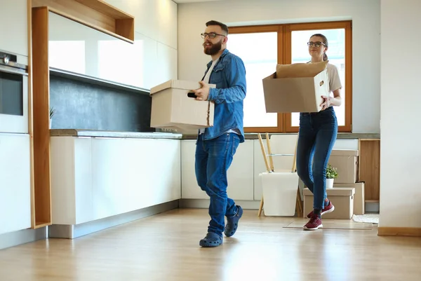 Young couple moving in to new home together