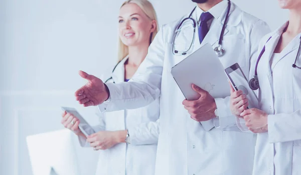 Male doctor offering handshake In Front Of His Colleagues — Stock Photo, Image