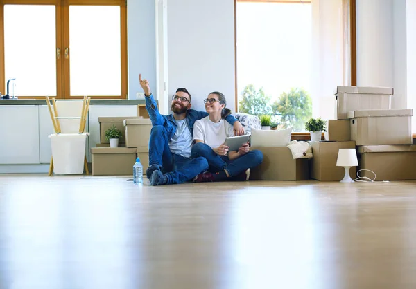 Young couple moving in to new home together