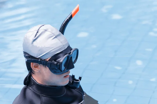 Free diving training on swimming pool