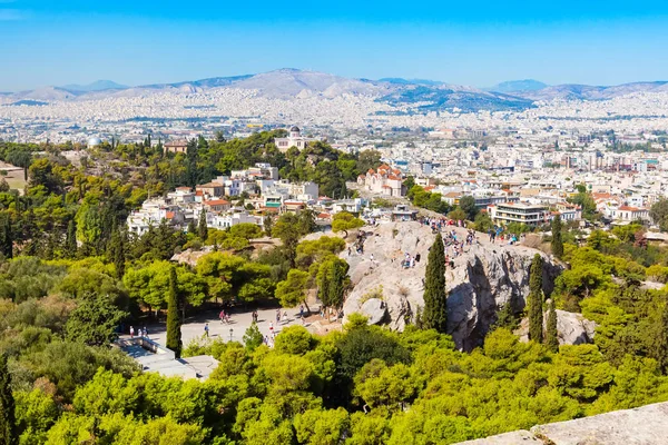 Athens skyline with Hill of the Nymphs, and church Agia Marina — Stock Photo, Image