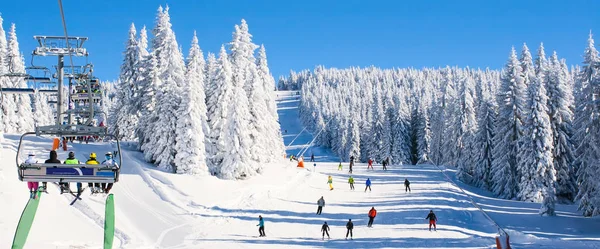 Ski resort Kopaonik, Serbia, lift, slope, people skiing