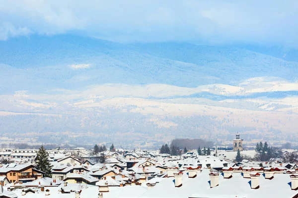 Houses with snow roofs panorama in bulgarian ski resort Bansko