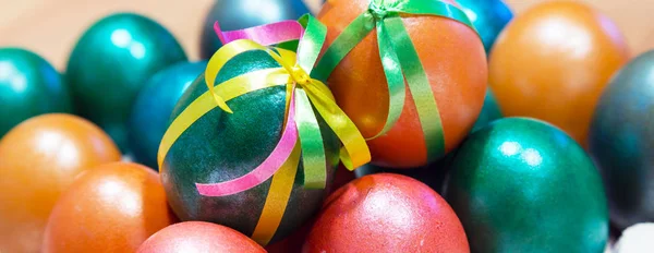 Colored bow decorated easter eggs — Stock Photo, Image