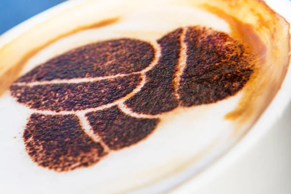 Cappuccino kahve çekirdeği çizim ile — Stok fotoğraf