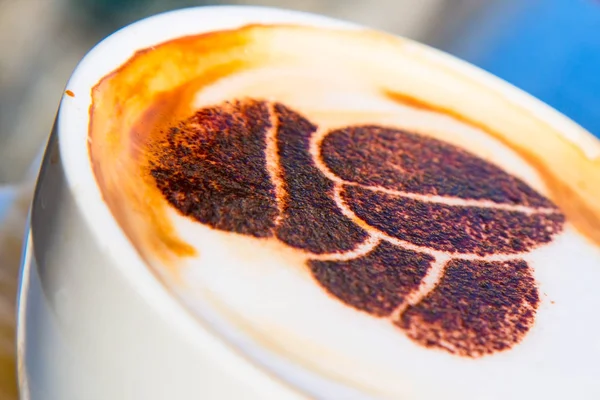 Cappuccino kahve çekirdeği çizim ile — Stok fotoğraf