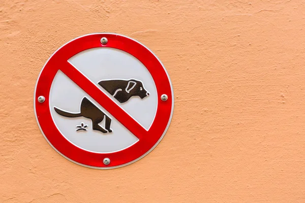 Sign No Dog Poop on the wall