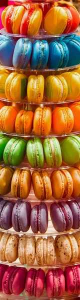 Vertical banner with traditional french dessert colorful macarons