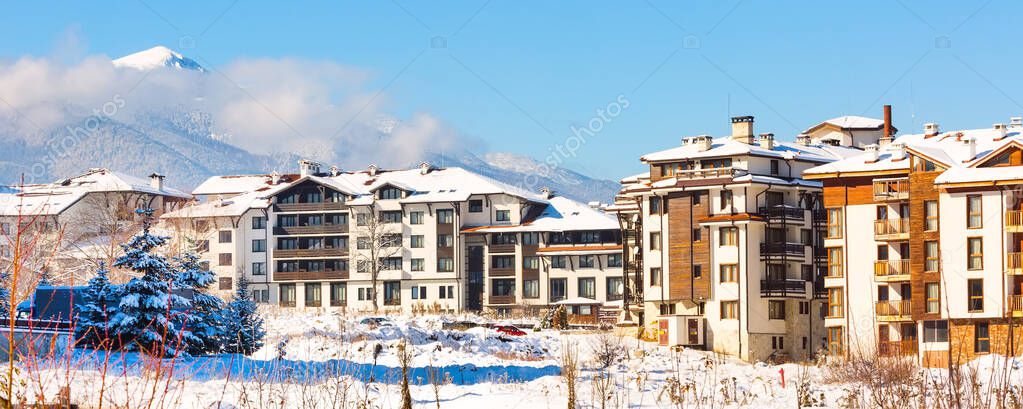 Houses and snow mountains in Bansko, Bulgaria