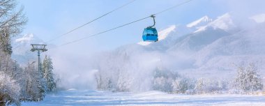 Ski resort Bansko, Bulgaria, cable car and slope clipart