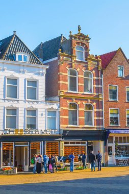 Peynir dükkanı ve Delft, Hollanda 'daki insanlar