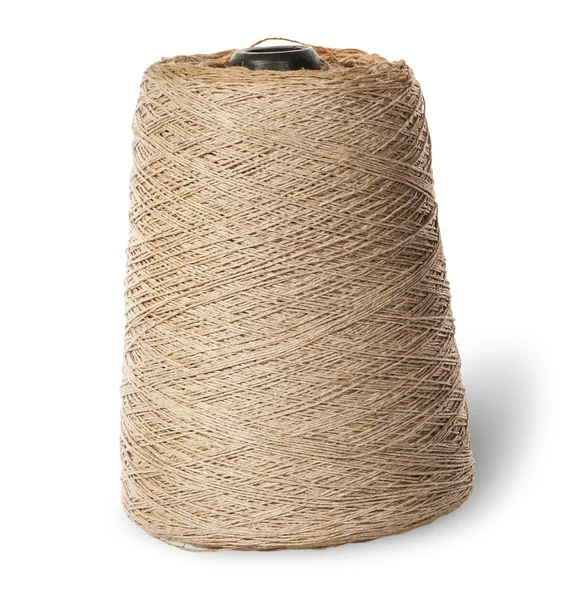 Vertical bobbin of old dirty thread beige — ストック写真