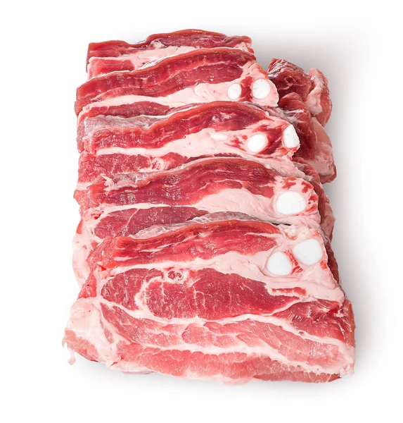 Raw pork belly slices in row — Stock Photo, Image