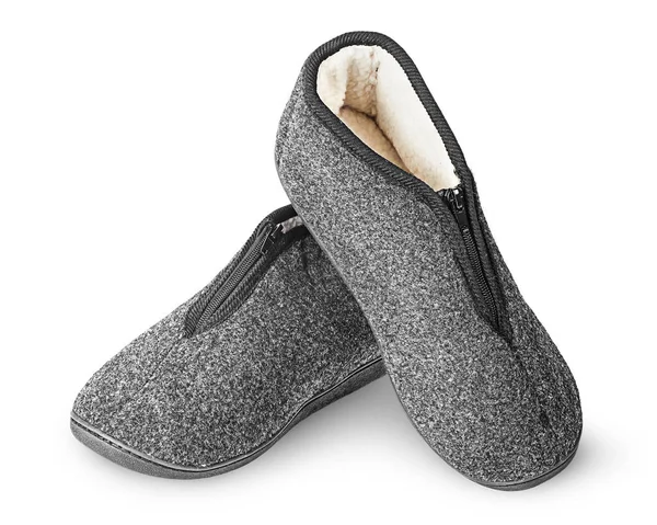 Zapatillas grises oscuras con piel una sobre otra —  Fotos de Stock