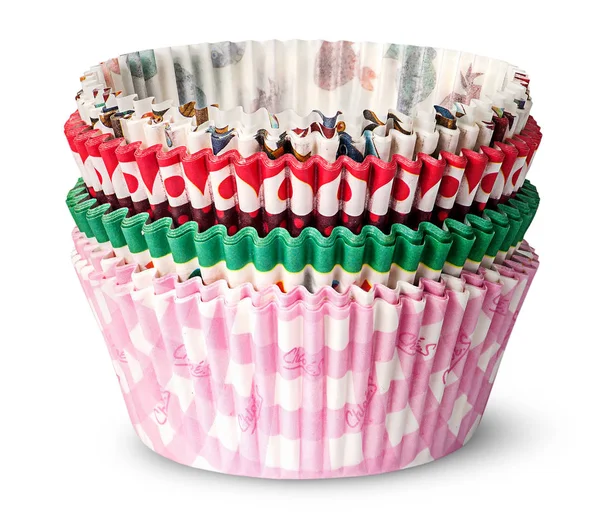 Pilha de copos de papel multicoloridos para assar muffins — Fotografia de Stock