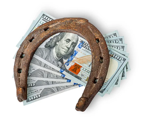 Velho ferradura enferrujado e dinheiro — Fotografia de Stock