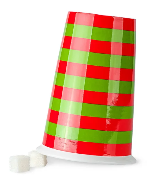 Obráceného šálek červené a zelené s kostky cukru — Stock fotografie