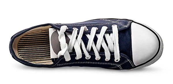 Zapato atlético azul único acostado en su costado —  Fotos de Stock