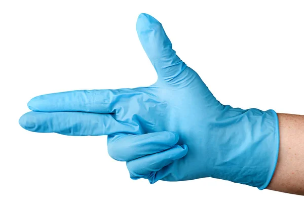 Ruku v modré latexové rukavice prsty pistole — Stock fotografie