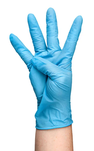 4 개의 손가락을 보여주는 블루 라텍스 장갑에 손을 — 스톡 사진