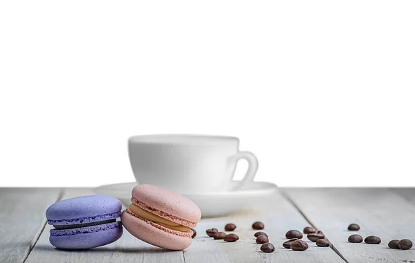 Two Macaroons White Table Cup Coffee Grains Isolated White Background — Stock Photo, Image