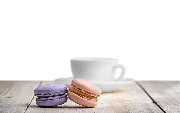 Two Macaroons Cup Coffee Wooden Table Isolated White Background — Stock Photo, Image
