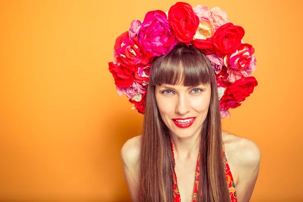 Romantic woman wearing floral hat — Stock Photo, Image