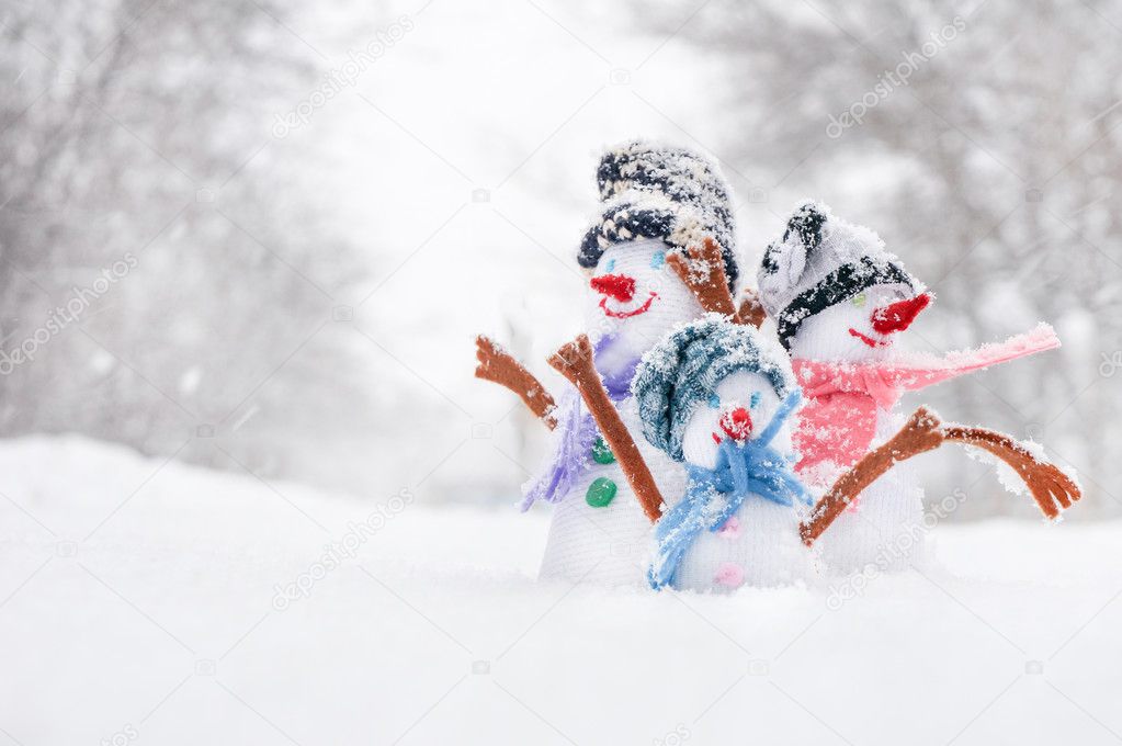 Snowman family outdoors