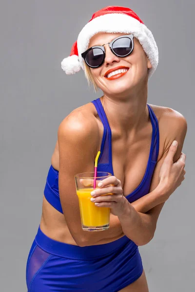 Sexy Santa claus woman holding cocktail — Stock Photo, Image
