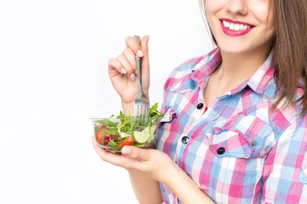 Portrait of attractive caucasian smiling woman eating salad — Stock Photo, Image