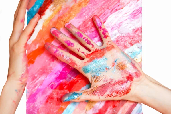 Hand en vlekkerig kleurrijke gek achtergrond — Stockfoto
