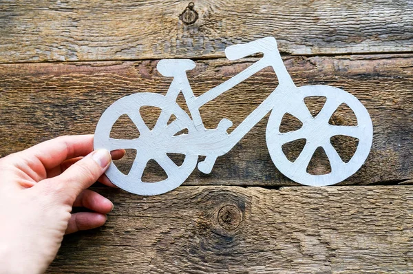 Bicicleta no fundo de madeira — Fotografia de Stock
