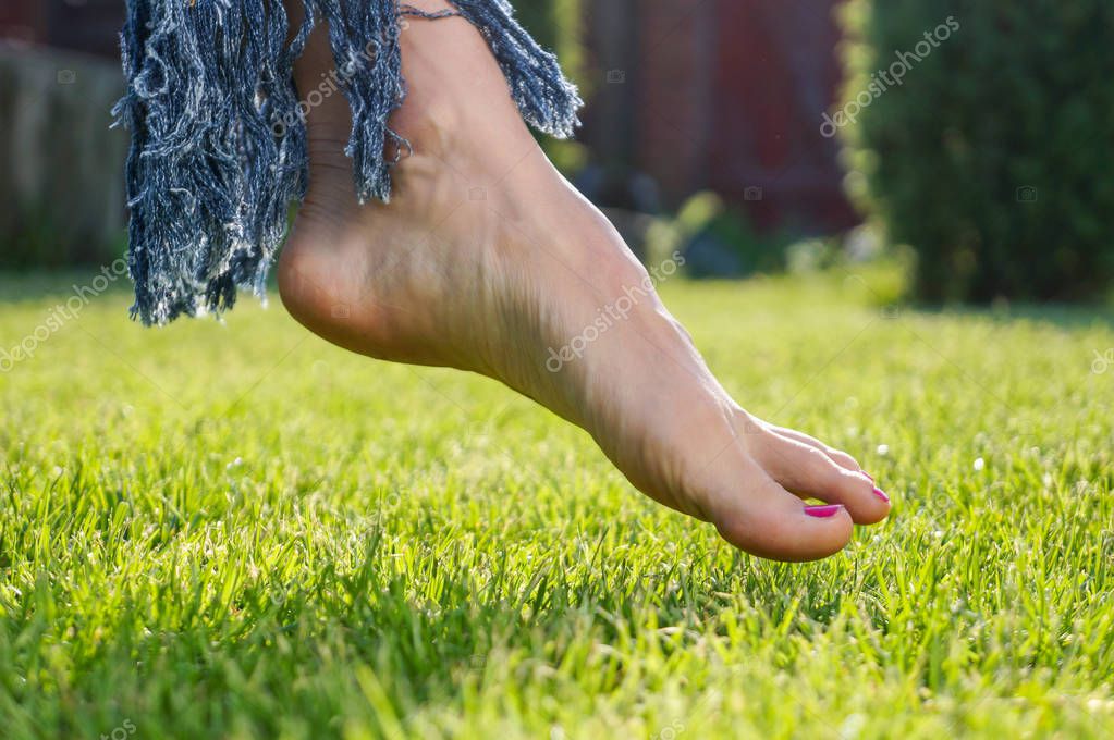 Barefoot Woman Laying Grass