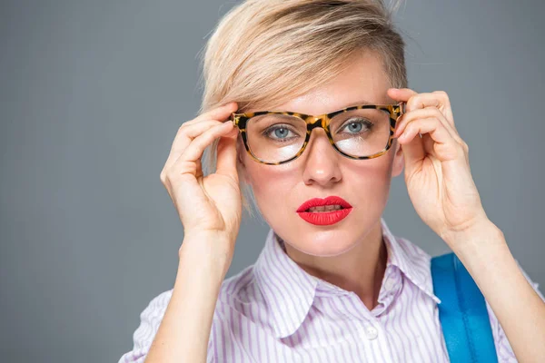 Beautiful woman with short hair and glasses — Stock Photo, Image