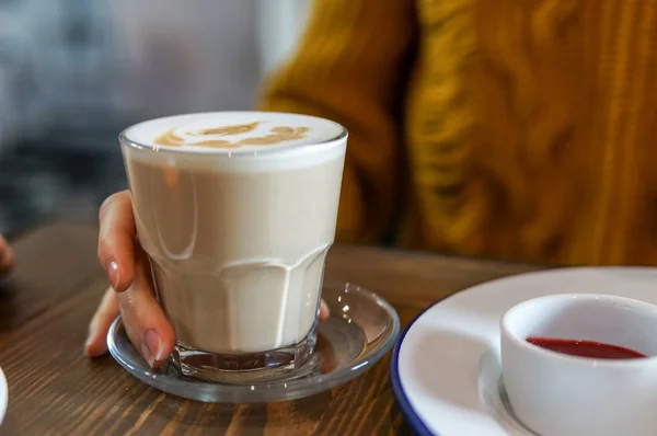 Latte in a glass in a vitange cafe — Stock Photo, Image