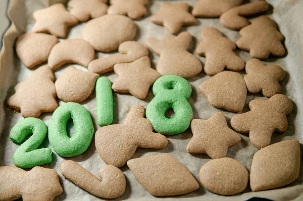 Christmas cookies ginger bread with 2018 green color decor