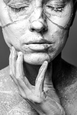 Art portrait of woman covered in clay, black and white clipart